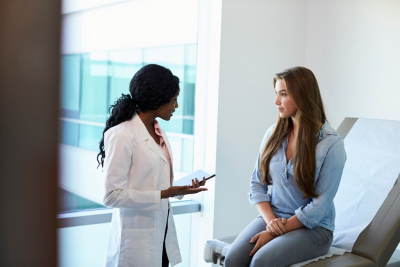 female doctor doing interview to her patient
